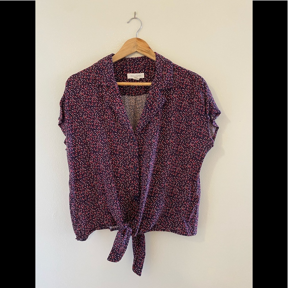 Miniature floral-patterned blouse with tie.
